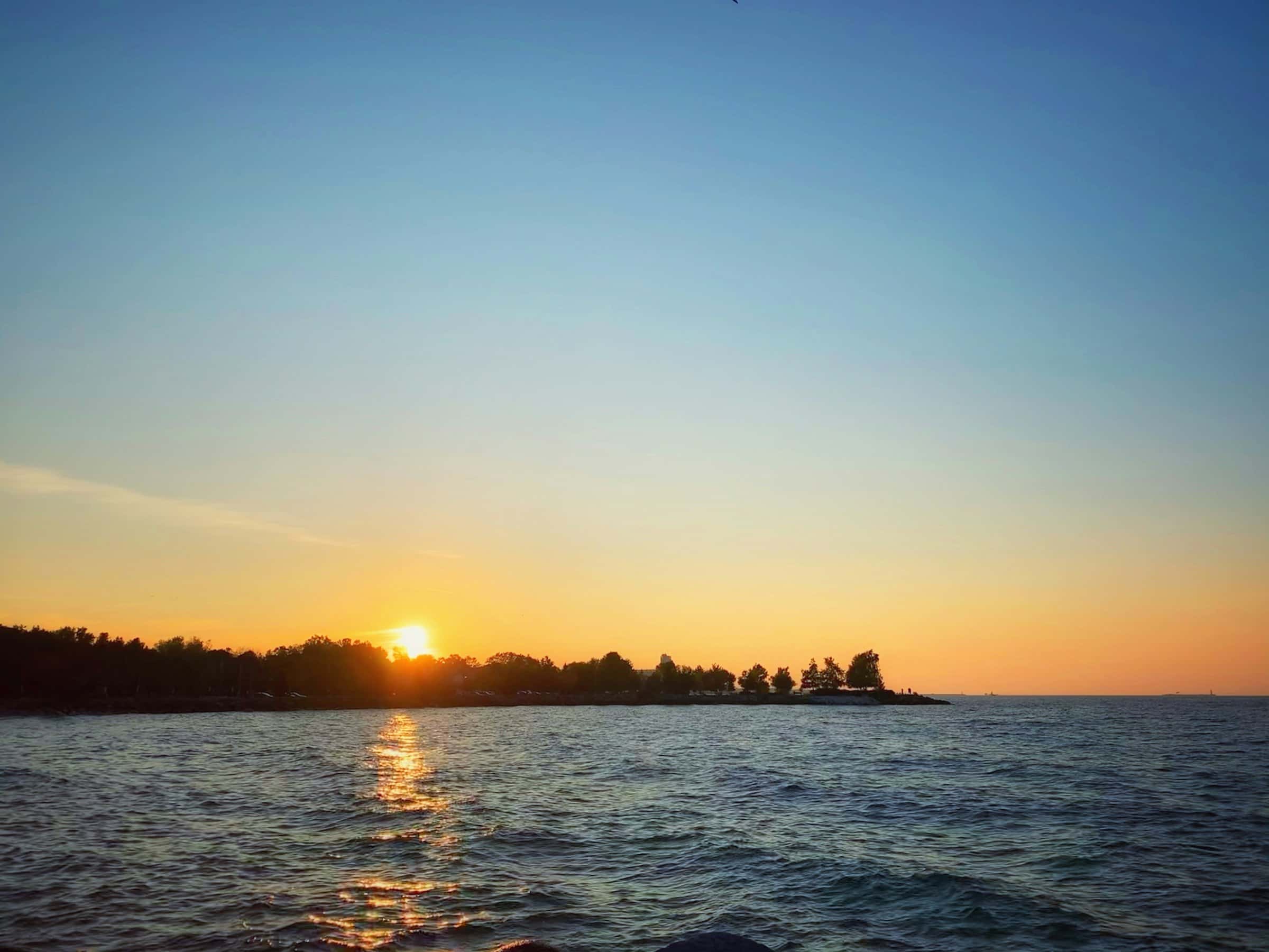 An island in silhouette at sunset, Collingwood